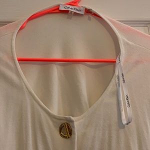 Cream Calvin Klein sweater with gold closure